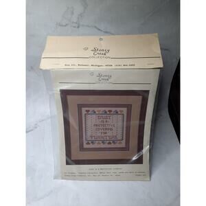 Stoney Creek Collection Cross Stitch Kit Dust Is A Protective Covering Sampler